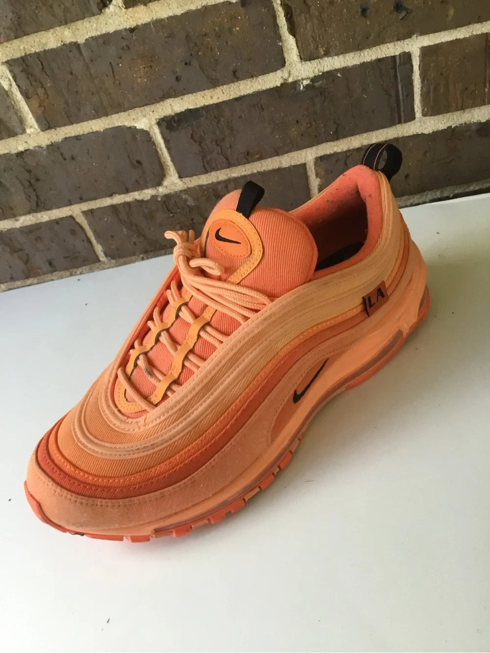 Nike Women’s Air Max 97 in Orange and Coral